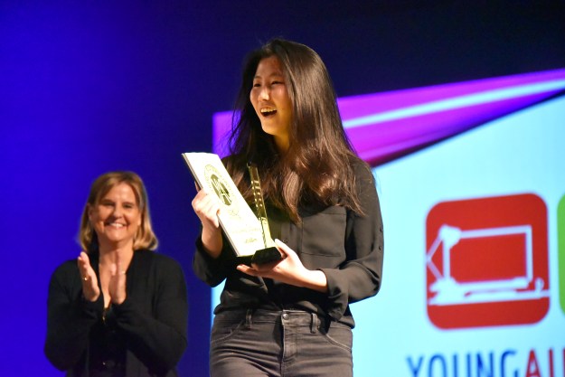 Student receiving award.